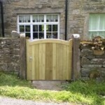 Wooden garden gate handcrafted from high-quality timber, custom-made by Richard Hope Wooden Gates for durability and style. Perfect for enhancing your outdoor space.