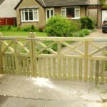 Richard Hope Wooden Gates handcrafted from durable wood, providing secure and attractive entrance solution for residential properties, garden access, and boundary marking.