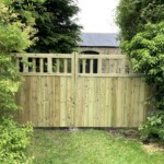 Beautifully crafted Richard Hope wooden garden gate made from high-quality timber, blending durability with classic style, perfect for enhancing privacy and aesthetic appeal in outdoor spaces.