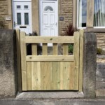 Handcrafted wooden gate for garden privacy, designed by Richard Hope Wooden Gates, featuring high-quality timber and traditional craftsmanship, perfect for enhancing curb appeal.