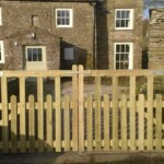 Wooden garden gate by Richard Hope, handcrafted from high-quality timber for durability and aesthetic appeal, perfect for enhancing garden entrances.