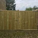 Natural wooden garden gate with sturdy design, ideal for privacy and security, custom-crafted by Richard Hope Wooden Gates for durable outdoor use and aesthetic appeal.