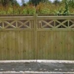 Handcrafted wooden gates by Richard Hope, made from quality timber, combining traditional craftsmanship with durability for garden and driveway security.
